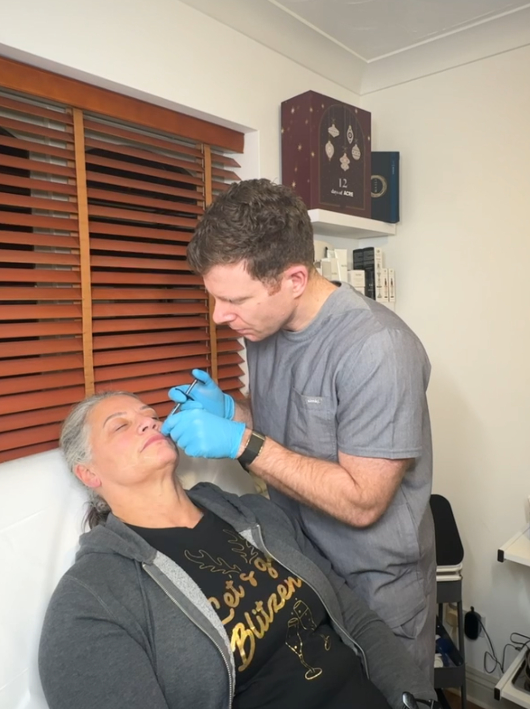 Pharmacist prescriber performing treatment